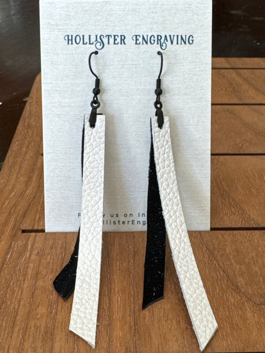 HE White leather/black suede fringe earrings $22