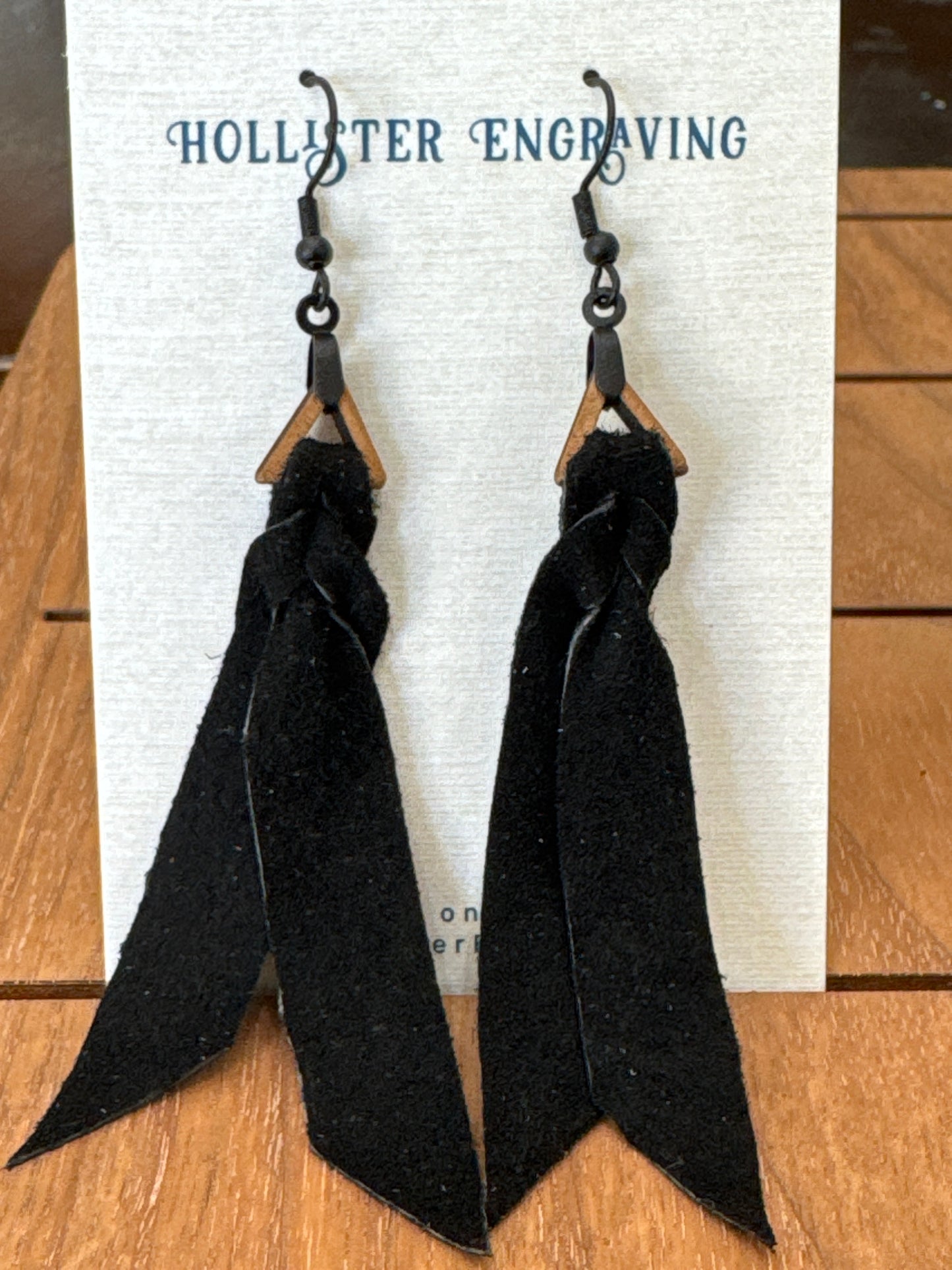 HE black suede fringe earrings $22